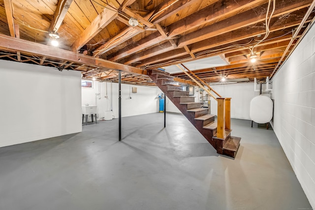 636 Thompson Rd, Thompson, CT 06277 - below grade area featuring oil tank, stairs, and a sink