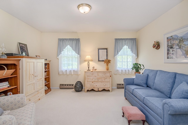 living area with a baseboard radiator, carpet, and baseboards