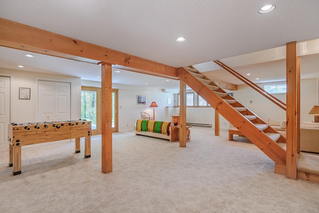 below grade area featuring recessed lighting, carpet floors, stairway, and baseboard heating