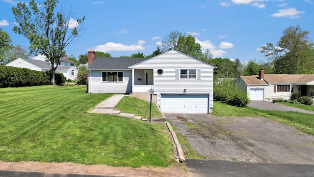 192 Morgan Cir, Wethersfield, CT 06109 - ranch-style house featuring an attached garage, a front lawn, driveway, and a chimney