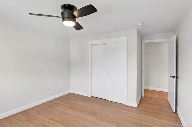 192 Morgan Cir, Wethersfield, CT 06109 - unfurnished bedroom featuring light wood-style flooring, a closet, and baseboards