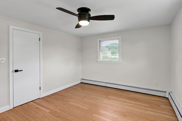 192 Morgan Cir, Wethersfield, CT 06109 - unfurnished room featuring a baseboard heating unit, a ceiling fan, light wood-style floors, and baseboards