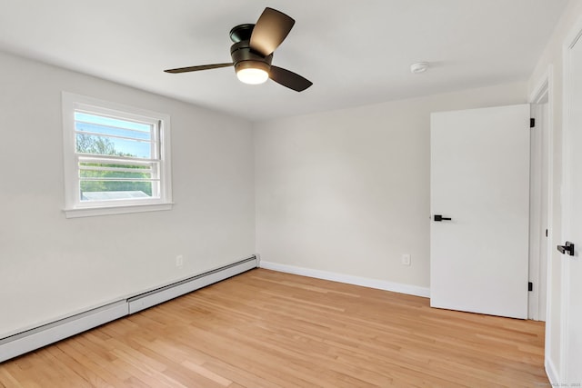 192 Morgan Cir, Wethersfield, CT 06109 - unfurnished room with a baseboard heating unit, light wood-type flooring, a ceiling fan, a smoke detector, and baseboards