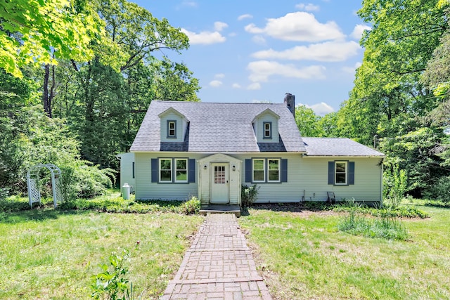 13 Hoyt Rd, Bethel, CT 06801 - cape cod home featuring a chimney and a front yard