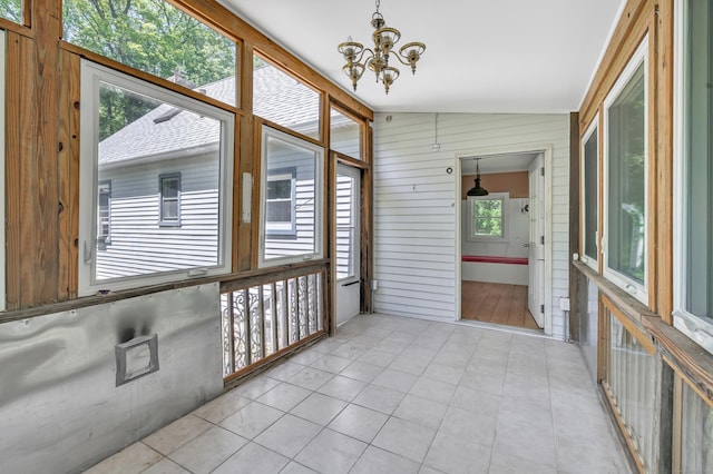 13 Hoyt Rd, Bethel, CT 06801 - unfurnished sunroom with a chandelier and lofted ceiling