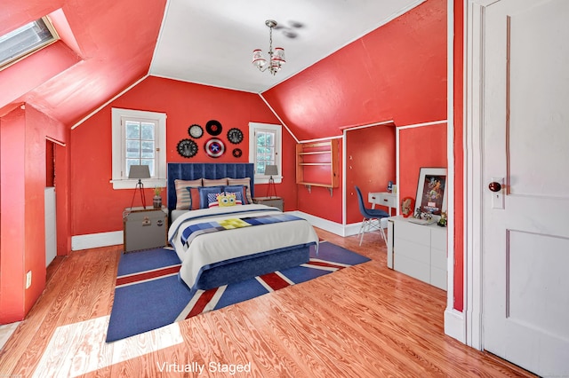 13 Hoyt Rd, Bethel, CT 06801 - bedroom with wood finished floors, vaulted ceiling, and baseboards
