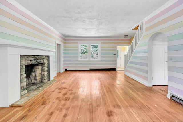 13 Hoyt Rd, Bethel, CT 06801 - unfurnished living room with a stone fireplace, wood-type flooring, stairs, and baseboard heating