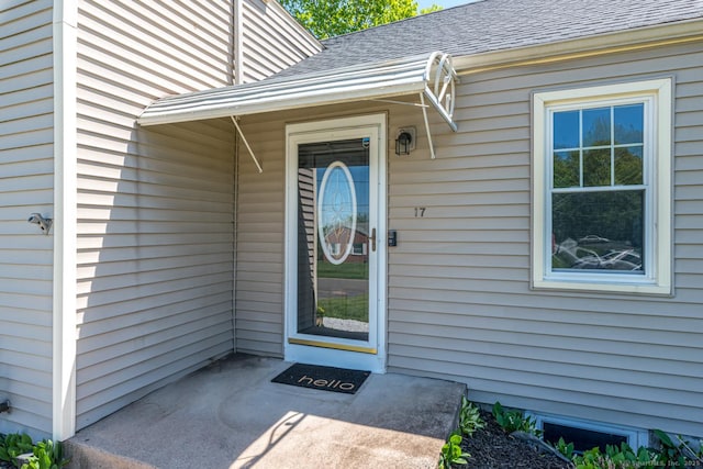 17 Emily Rd, East Windsor, CT 06016 - property entrance featuring a shingled roof