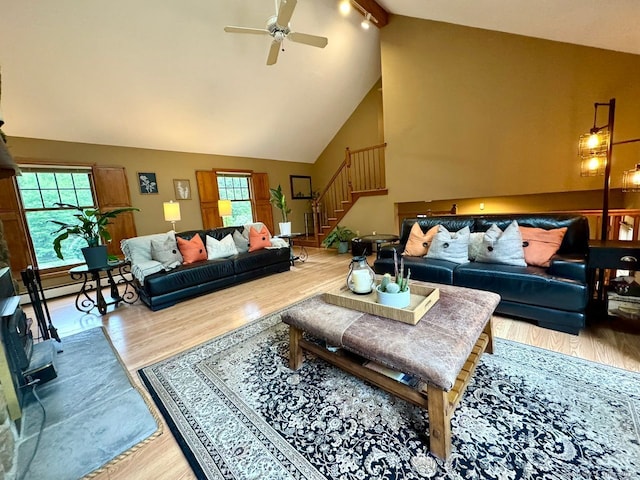 9 Pheasant Run, Granby, CT 06060 - living room featuring stairway, wood finished floors, a ceiling fan, beamed ceiling, and high vaulted ceiling