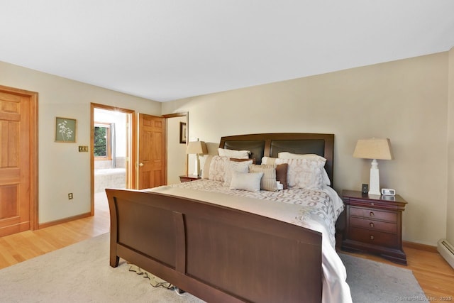 9 Pheasant Run, Granby, CT 06060 - bedroom featuring light wood finished floors, baseboards, and ensuite bath