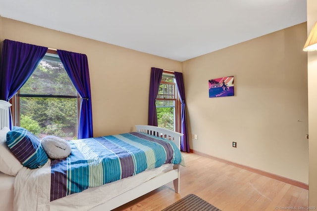 9 Pheasant Run, Granby, CT 06060 - bedroom featuring wood finished floors, multiple windows, and baseboards