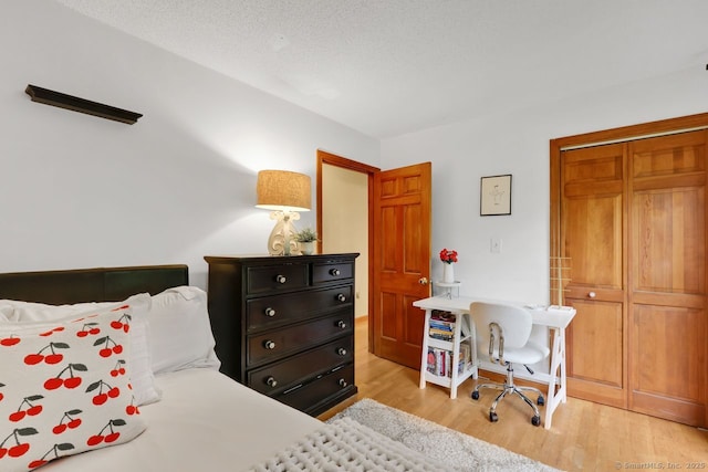 9 Pheasant Run, Granby, CT 06060 - bedroom featuring light wood-style flooring and a closet