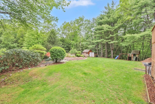9 Pheasant Run, Granby, CT 06060 - view of green lawn with a playground