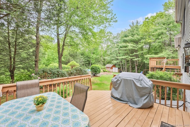 9 Pheasant Run, Granby, CT 06060 - wooden terrace featuring outdoor dining space and area for grilling