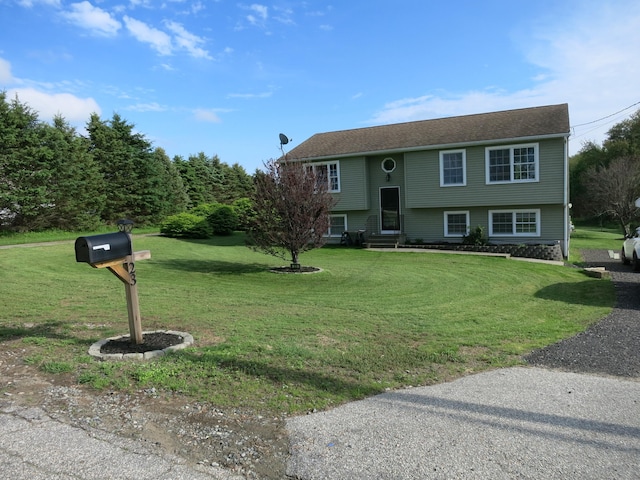 23 Hell Hollow Rd, Sterling, CT 06384 - bi-level home with entry steps and a front yard