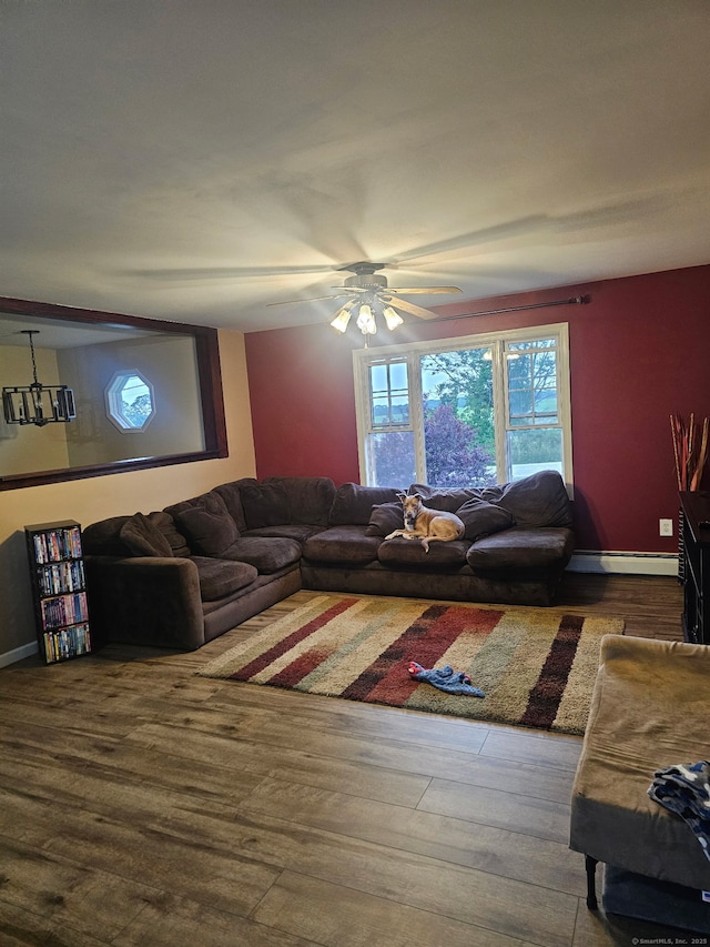 23 Hell Hollow Rd, Sterling, CT 06384 - living room featuring wood finished floors, ceiling fan, and a baseboard heating unit