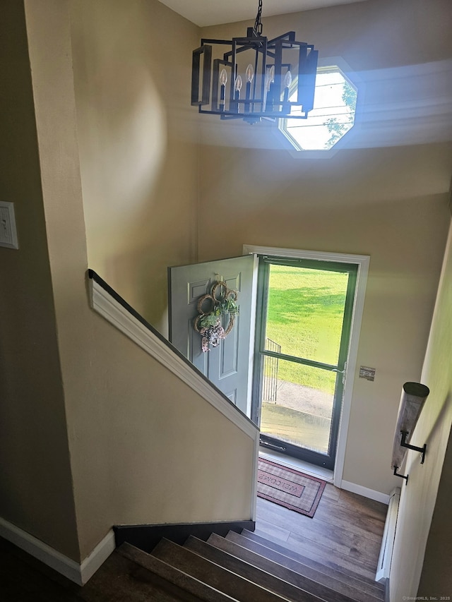 23 Hell Hollow Rd, Sterling, CT 06384 - foyer entrance featuring a chandelier, stairway, and wood finished floors