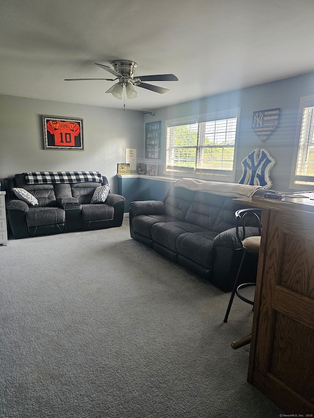 23 Hell Hollow Rd, Sterling, CT 06384 - carpeted living area with healthy amount of natural light and a ceiling fan