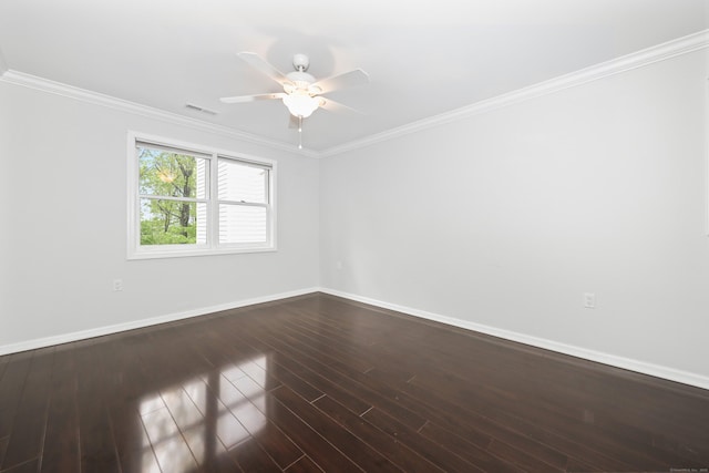 spare room with baseboards, a ceiling fan, dark wood-style floors, and ornamental molding