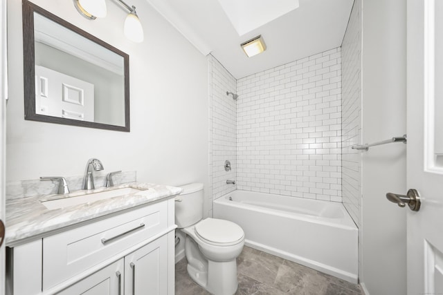 bathroom featuring toilet, vanity, and shower / bath combination