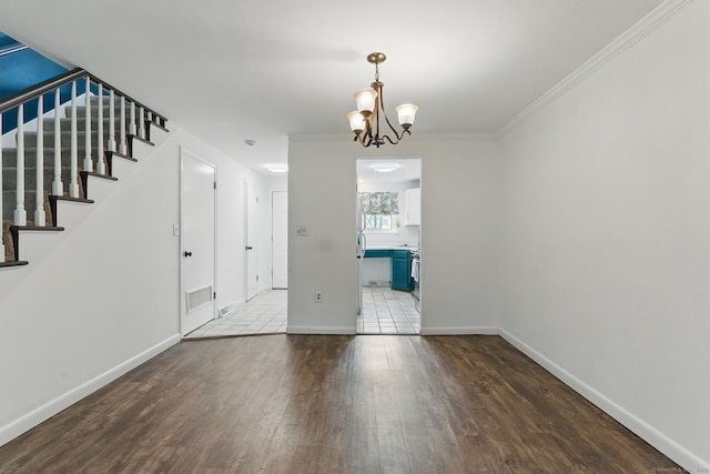 404 Cedar Hollow Dr Unit 404, Rocky Hill, CT 06067 - unfurnished dining area with wood finished floors, stairway, baseboards, a chandelier, and crown molding