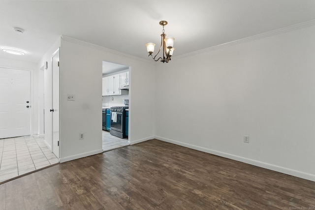 404 Cedar Hollow Dr Unit 404, Rocky Hill, CT 06067 - spare room with a chandelier, wood finished floors, baseboards, ornamental molding, and a smoke detector