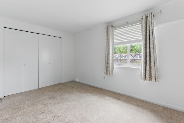 404 Cedar Hollow Dr Unit 404, Rocky Hill, CT 06067 - unfurnished bedroom featuring carpet floors and a closet