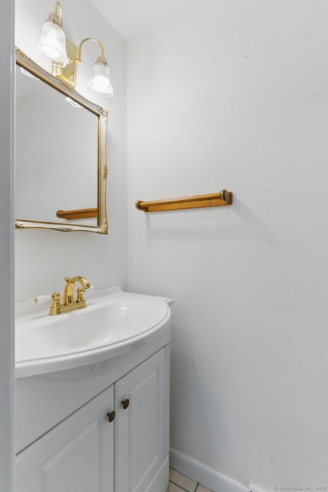 404 Cedar Hollow Dr Unit 404, Rocky Hill, CT 06067 - bathroom featuring vanity, tile patterned flooring, and baseboards