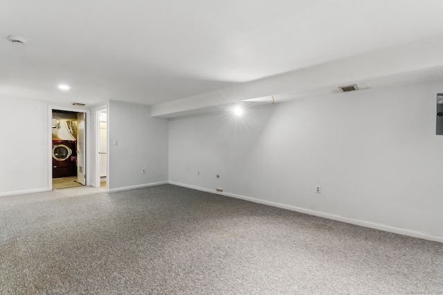 404 Cedar Hollow Dr Unit 404, Rocky Hill, CT 06067 - finished below grade area with baseboards, light carpet, and washer / dryer