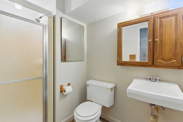 404 Cedar Hollow Dr Unit 404, Rocky Hill, CT 06067 - bathroom featuring baseboards, a shower stall, toilet, and a sink