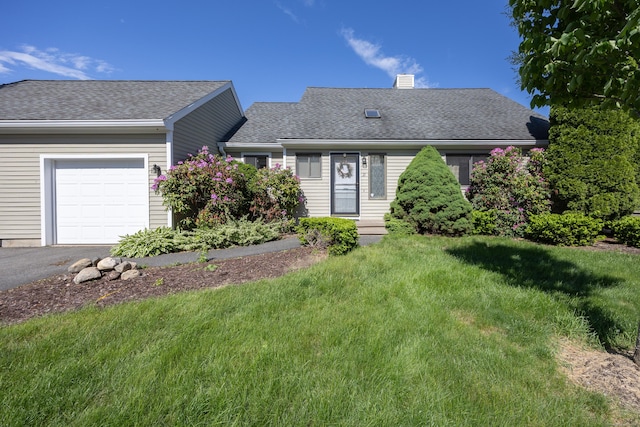 21 Cannon Ridge Dr Unit 21, Watertown, CT 06795 - view of front of home with an attached garage, a front yard, a chimney, a shingled roof, and driveway