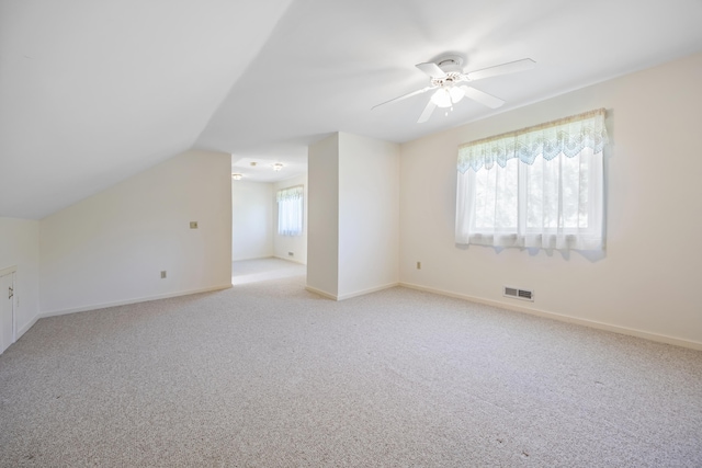 21 Cannon Ridge Dr Unit 21, Watertown, CT 06795 - bonus room with light carpet, a ceiling fan, baseboards, and lofted ceiling