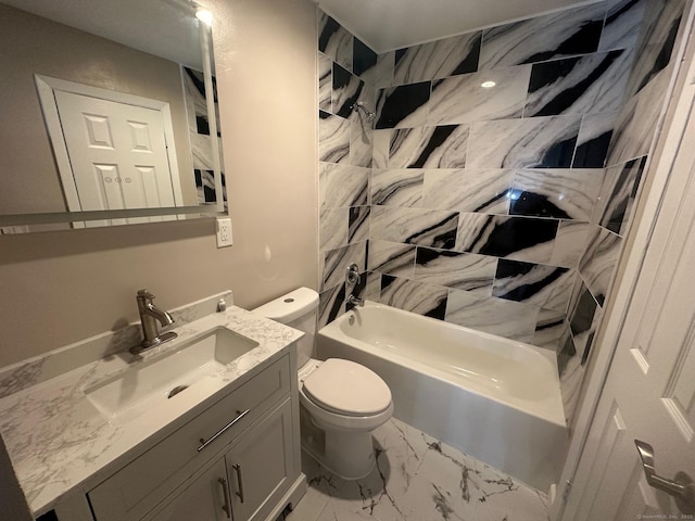 bathroom featuring toilet, marble finish flooring, shower / bathtub combination, and vanity