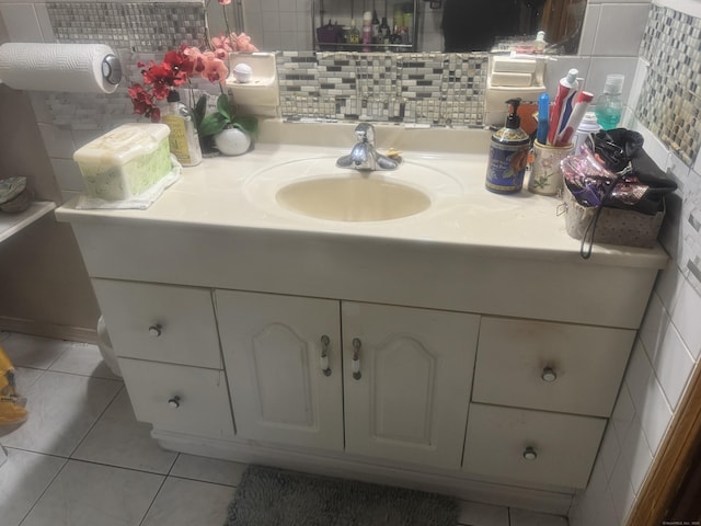 57 Britt Rd, East Hartford, CT 06118 - bathroom featuring vanity, tile patterned flooring, and tasteful backsplash