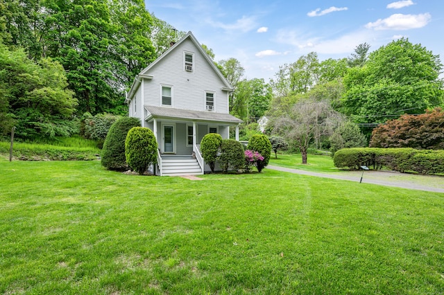 5 New Street Ext, Wilton, CT 06897 - view of front facade featuring covered porch and a front yard