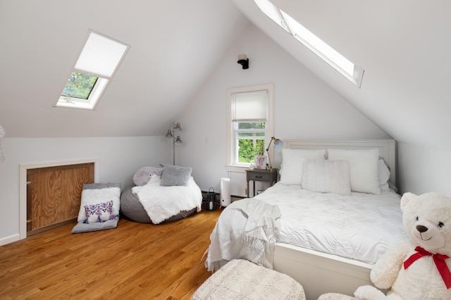 5 New Street Ext, Wilton, CT 06897 - bedroom with a skylight, wood finished floors, and vaulted ceiling