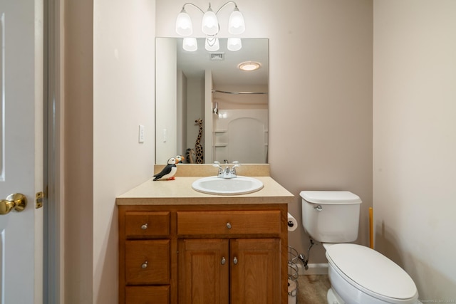 full bathroom featuring toilet and vanity
