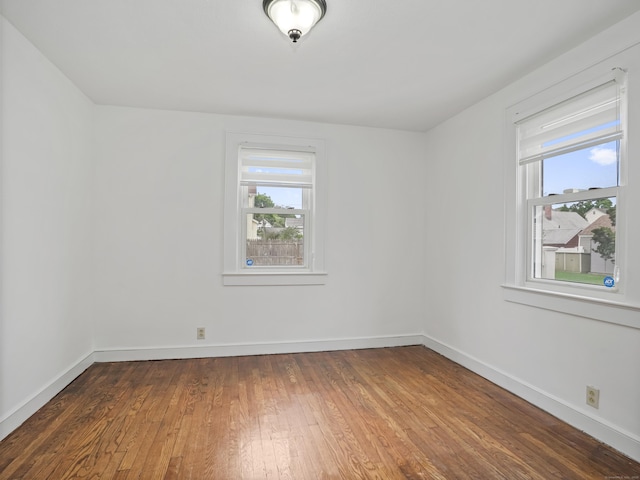 31 Emerson St, Norwalk, CT 06855 - unfurnished room with baseboards and hardwood / wood-style flooring