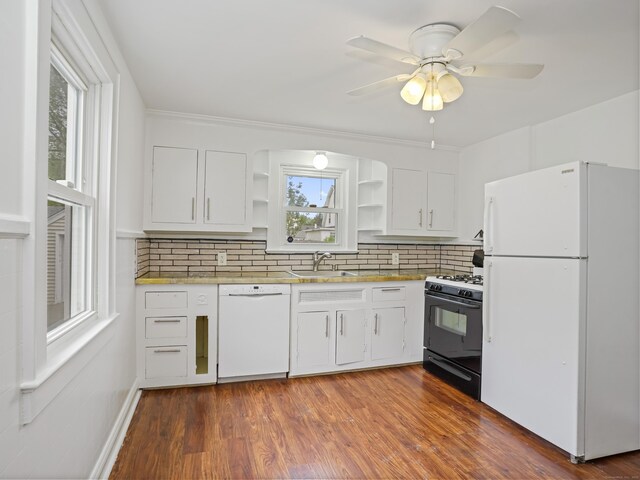 31 Emerson St, Norwalk, CT 06855 - kitchen featuring white appliances, open shelves, a sink, backsplash, and white cabinetry