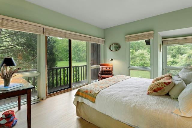 32 Beeholm Rd, Redding, CT 06896 - bedroom with access to outside and light wood finished floors