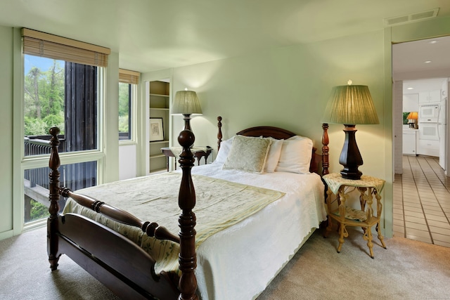 32 Beeholm Rd, Redding, CT 06896 - carpeted bedroom with access to outside and tile patterned flooring