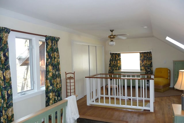 32 Beeholm Rd, Redding, CT 06896 - corridor featuring an upstairs landing, wood finished floors, and lofted ceiling