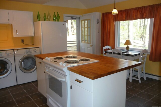 32 Beeholm Rd, Redding, CT 06896 - kitchen with white appliances, wood counters, dark tile patterned floors, washing machine and clothes dryer, and plenty of natural light