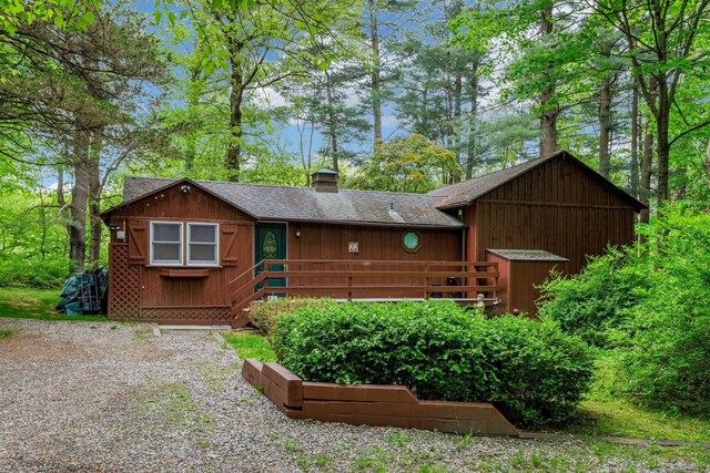 32 Beeholm Rd, Redding, CT 06896 - rustic home featuring a chimney, a shingled roof, and a deck