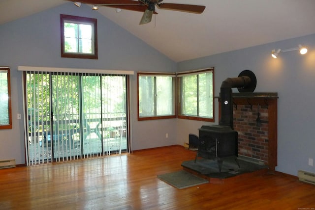 32 Beeholm Rd, Redding, CT 06896 - unfurnished living room featuring ceiling fan, wood finished floors, a wood stove, high vaulted ceiling, and a baseboard radiator