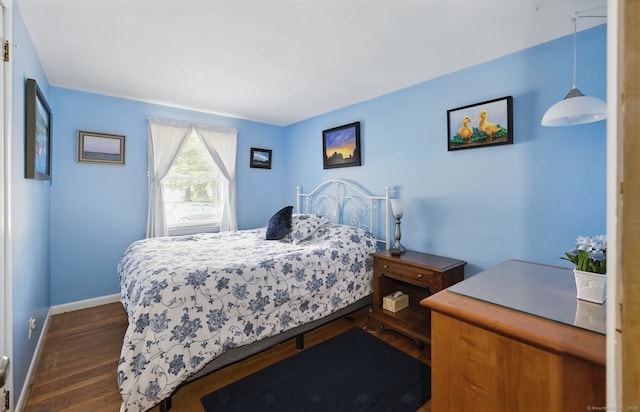 149 Edgewood Dr, Torrington, CT 06790 - bedroom with dark wood-type flooring and baseboards