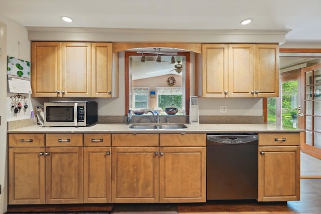 149 Edgewood Dr, Torrington, CT 06790 - kitchen with black dishwasher, a sink, stainless steel microwave, lofted ceiling, and recessed lighting