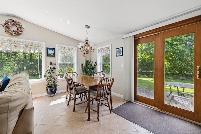 149 Edgewood Dr, Torrington, CT 06790 - dining area featuring vaulted ceiling, light tile patterned flooring, a chandelier, and baseboards
