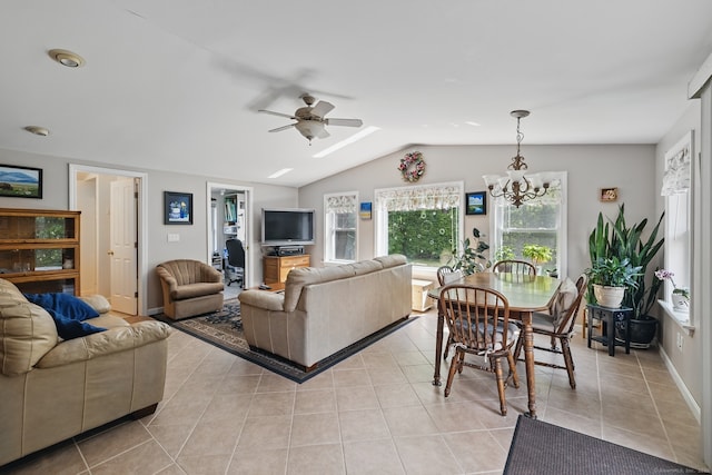 149 Edgewood Dr, Torrington, CT 06790 - living room with light tile patterned floors, vaulted ceiling, ceiling fan, a chandelier, and baseboards