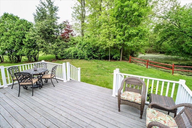 9 Rosick Rd, Wallingford, CT 06492 - wooden deck with outdoor dining space and view of wooded area